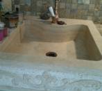 Kitchen in white wood and scabas travertine